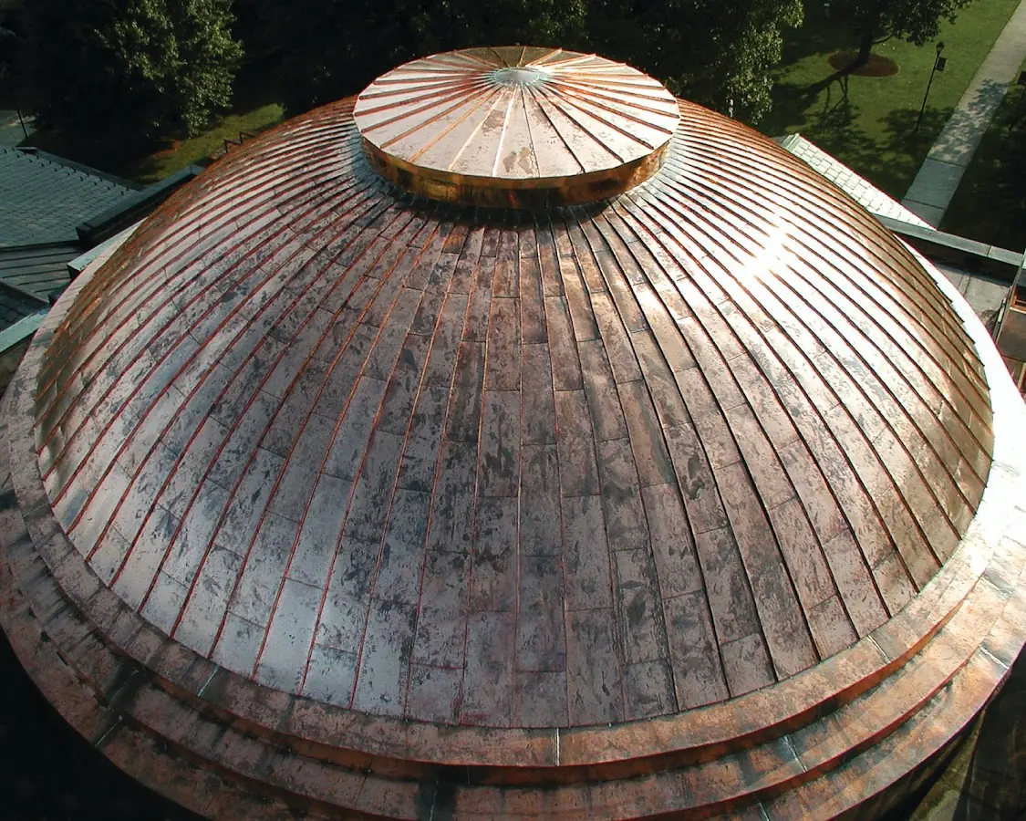 Craftsman Roofing crew installing a new roof in East Great Plains